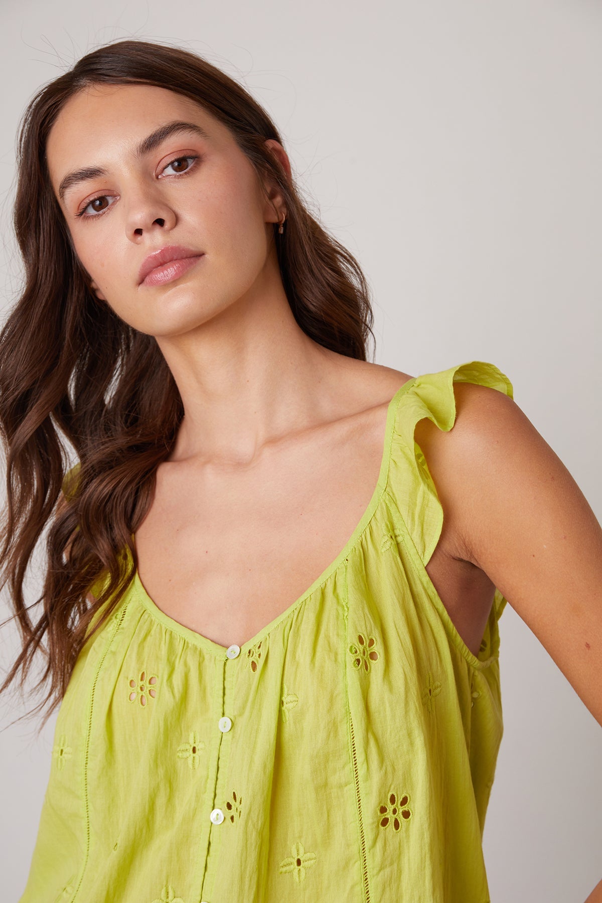 Front detail of Coco cotton eyelet top in lime.-25275477393604