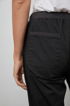 MIsty cotton twill pant in onyx black back pocket detail.