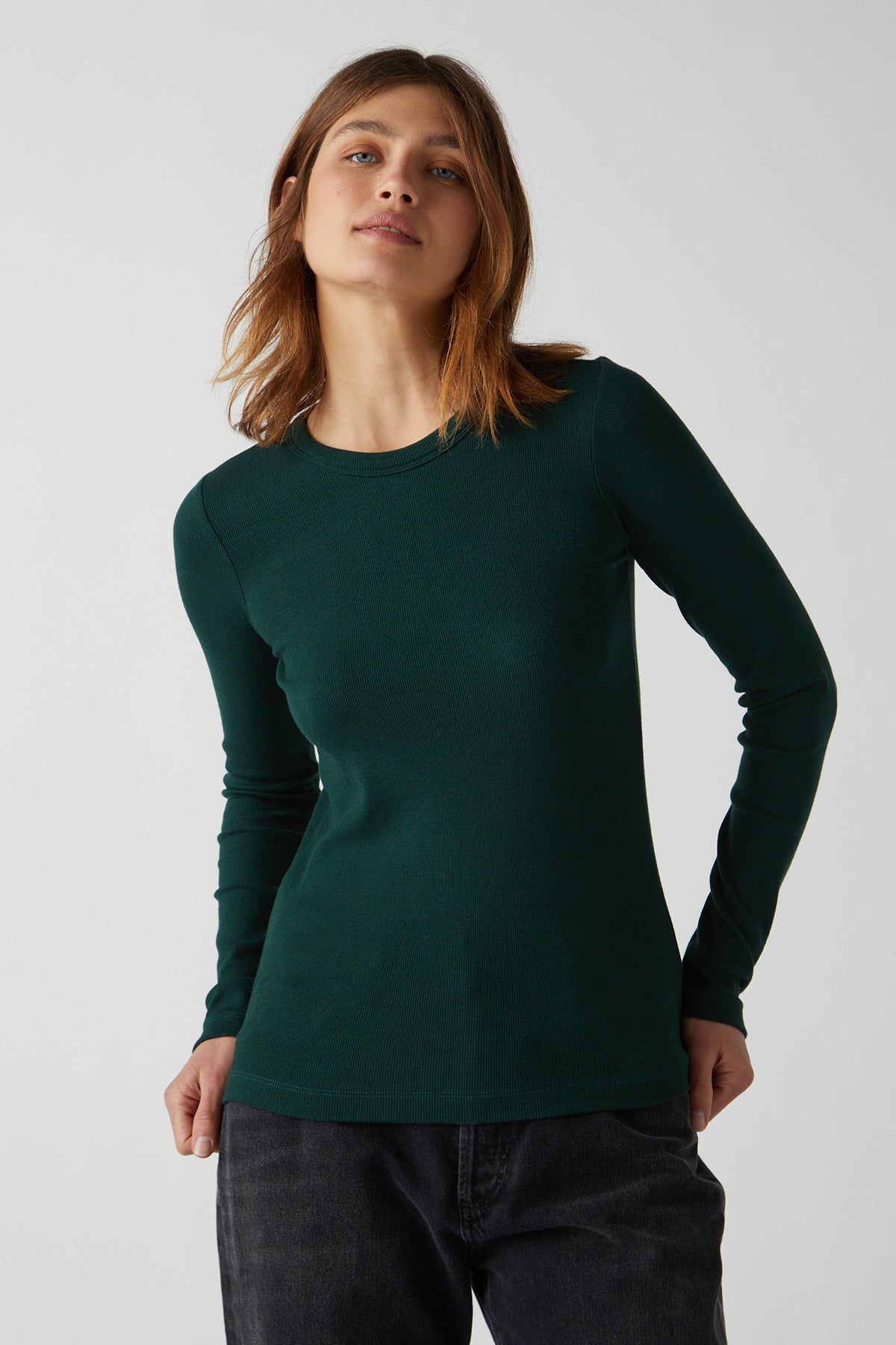 Camino Tee in forest green with black denim front-27196406333636