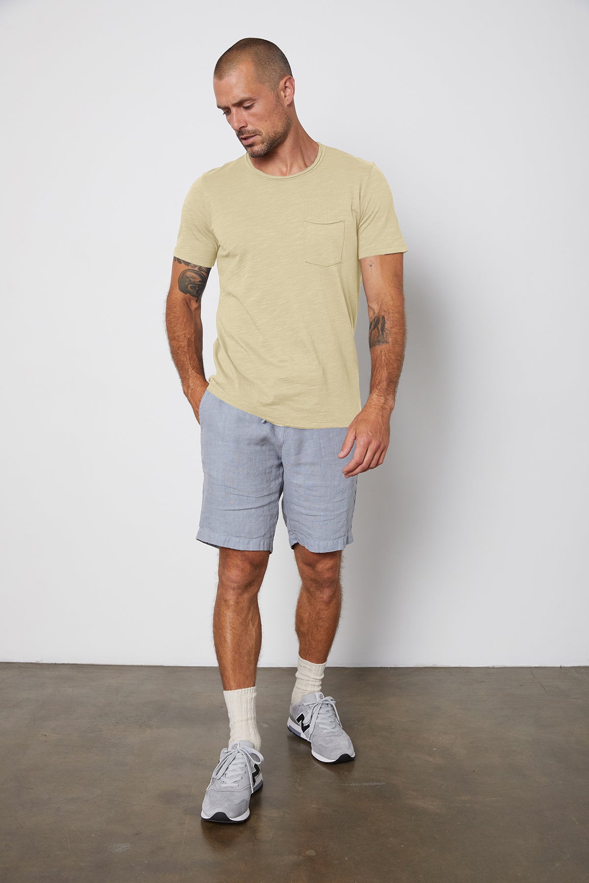 Chad Raw Edge Cotton Slub Pocket Tee in Olivine with Jonathan shorts in chambray front-25282458845380