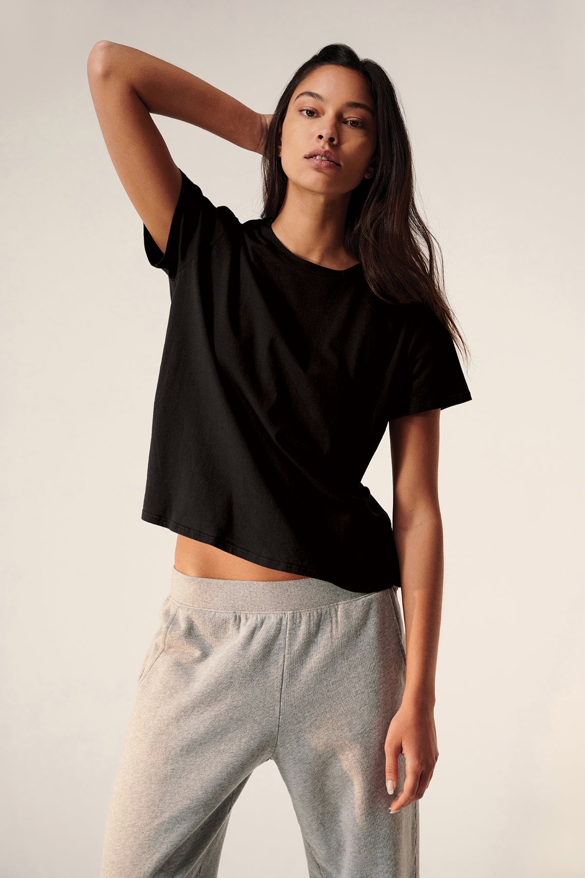 a woman wearing a black t-shirt and Velvet by Jenny Graham ZUMA SWEATPANT.